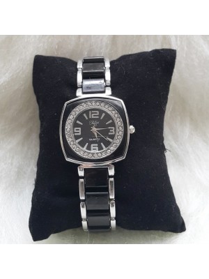 GÜMÜŞ KORDONU SİYAH ŞERİTLİ KASASI TAŞLI ÖZEL BAYAN KOL SAATİ